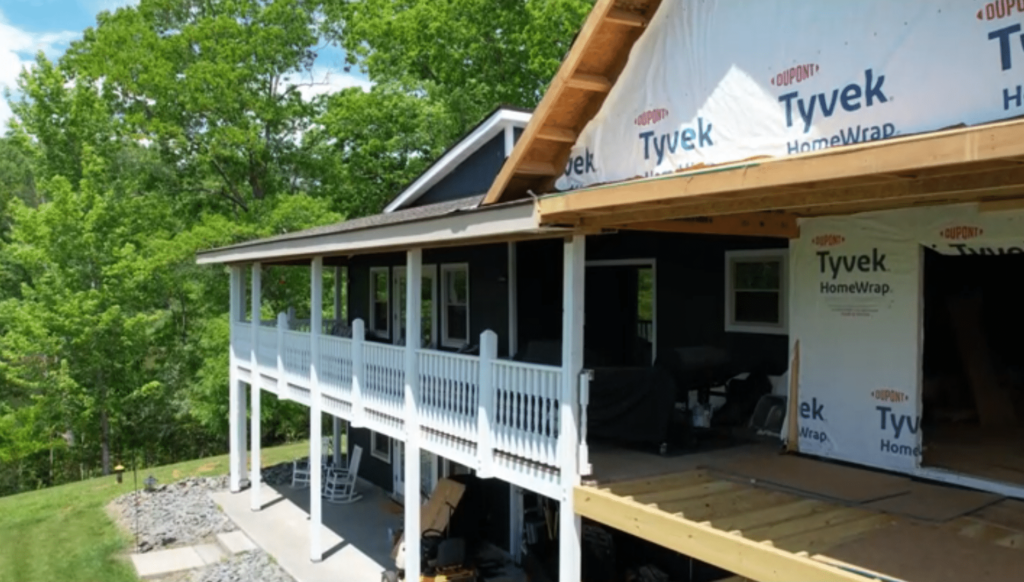 Home addition Blue house in Smith Mountain Lake