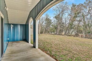 Blue house outside porch concrete